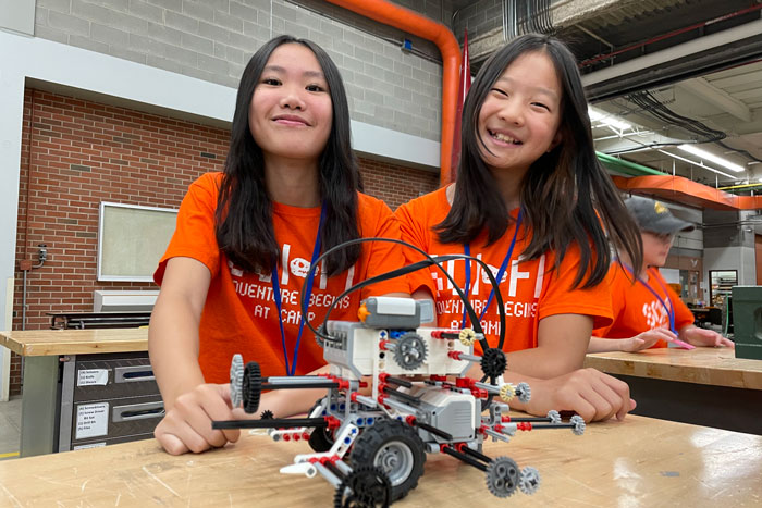 Two young girls attending SCI-FI summer camp